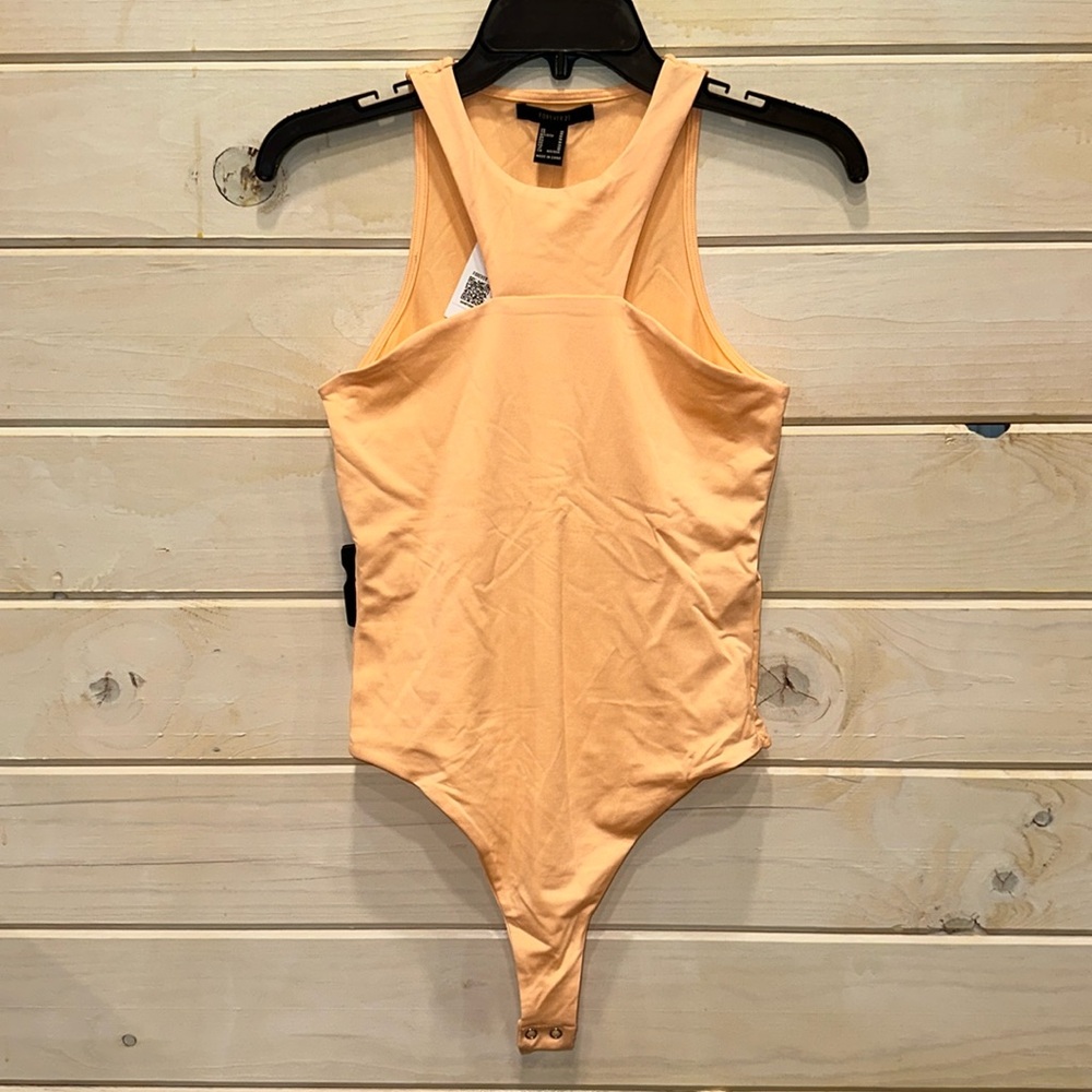 NWT Apricot color bodysuit size Medium!